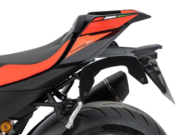 Supports latéraux C-Bow noirs pour Aprilia Tuono V4 1100 Factory (25-) Hepco & Becker